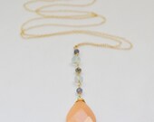 Long gold necklace.Casual...