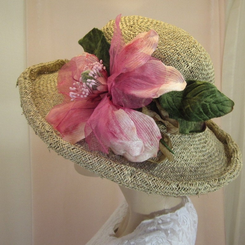 Summer straw hat with rolled brim for summer day.