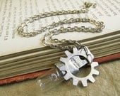 Steampunk lightbulb necklace. Glass bulb and gear pendant. Handmade jewelry. Clockwork pendant