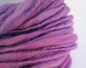 Jacaranda   - Hand spun yarn, hand dyed slub. Thick and thin. Pure Australian 21 micron merino wool.
