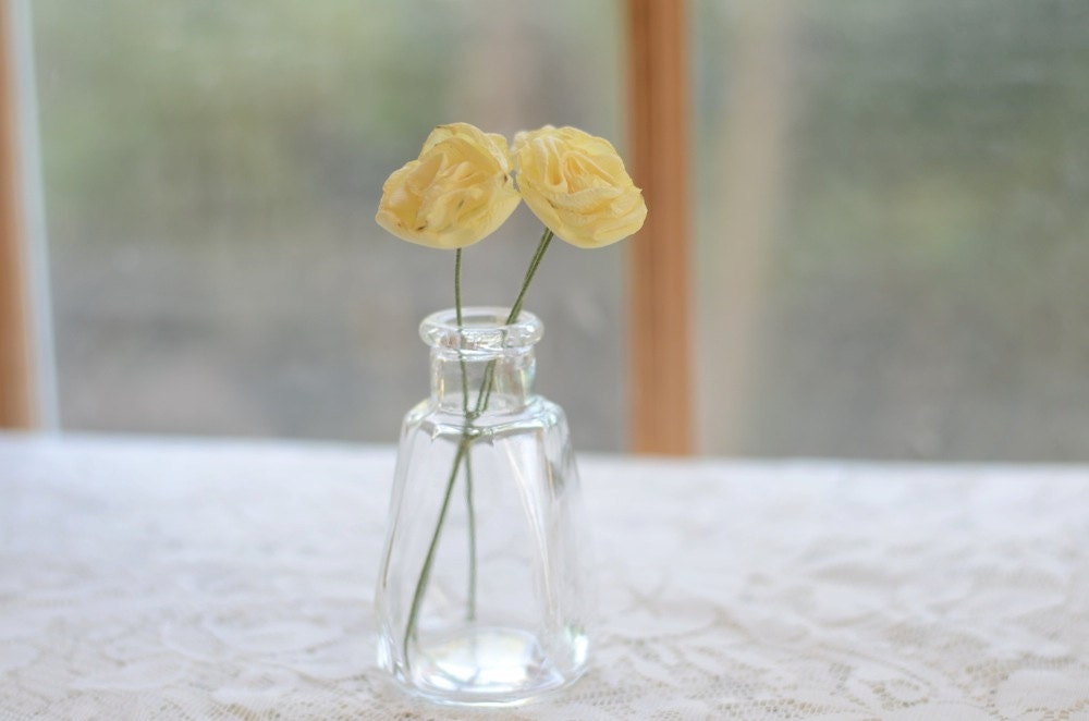 eco friendly vase of butter yellow fabric flowers