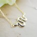 snake necklace in gold/silver