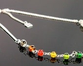 Lively 18" multi colored rainbow glass beads swirl necklace with silver accents