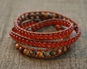 Red, Carnelian, jasper, triple wrap leather beaded bracelet.  Semiprecious stones, medium brown leather, button closure