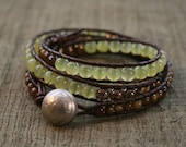 Olivine jade triple wrap leather beaded bracelet.  Semiprecious stones, shell beads, dark brown leather. Spring colors.