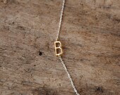 sideways delicate gold initial necklace, gold monogram charm on silver chain custom letter necklace