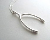 Silver wishbone pendant necklace on long delicate silver chain, vintage-inspired