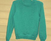 Girl, size 12/14, turquoise raglan sleeve sweater.