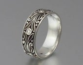 The WHITE COUNT silver and white sapphires wedding band