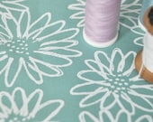 white on sage Scruffy Daisy screen printed fabric