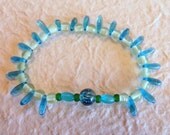 A Blue Tear Stretch Bracelet