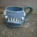 hand thrown, stoneware ceramic demon mug
