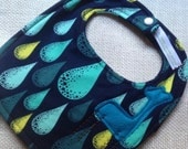 Blue Giraffe in the Rain Bib