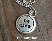 Hand stamped Be Nice silver droplet pendant necklace