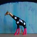 polka dot giraffe // the strange planet