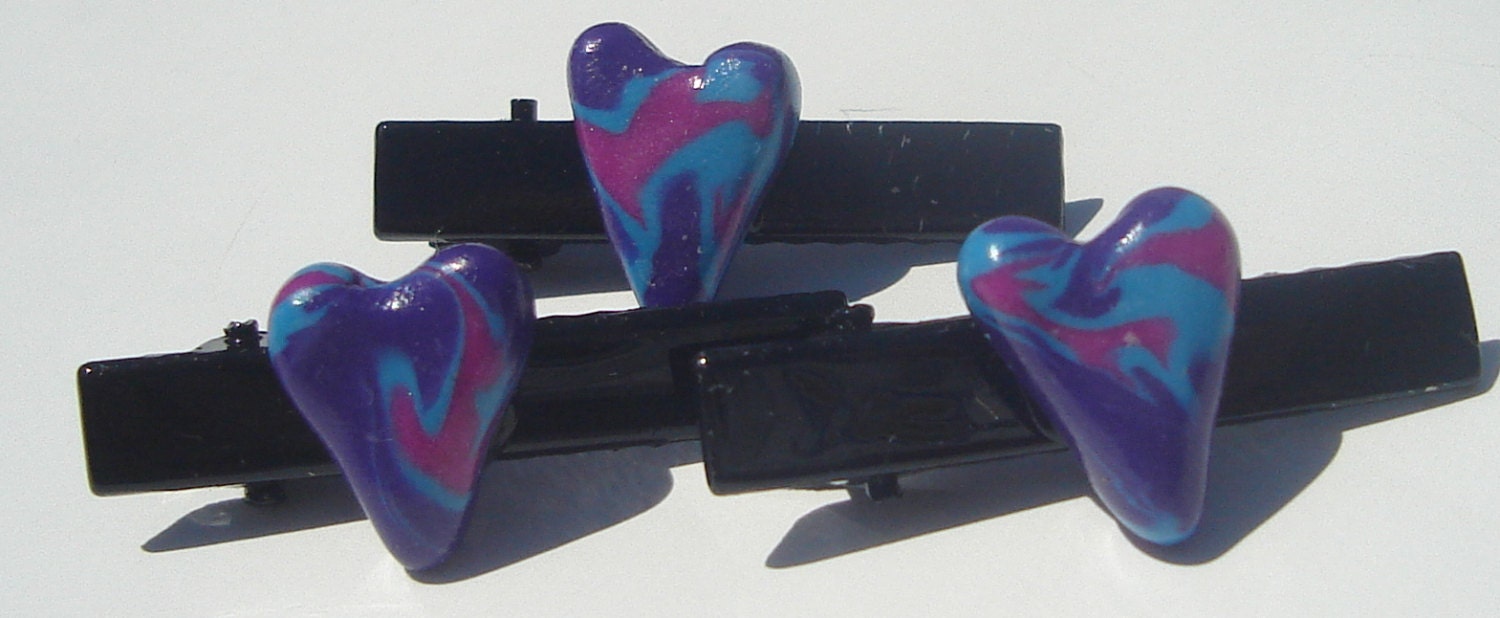 A Trio of Hearts purple, pink, and light blue swirled polymer clay hearts hand made hair clips