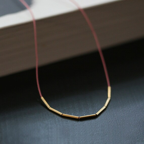 fay - minimalist silk and gold necklace by elephantine