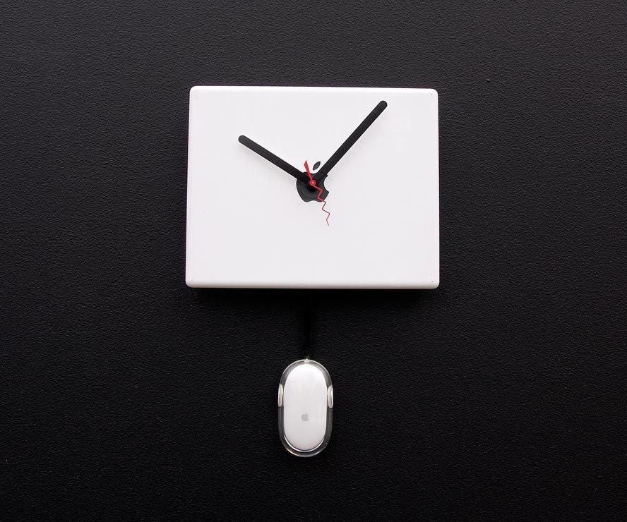 Clock created from a recycled Apple ibook laptop cover