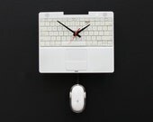 Clock created from a recycled Apple ibook laptop keyboard and cover