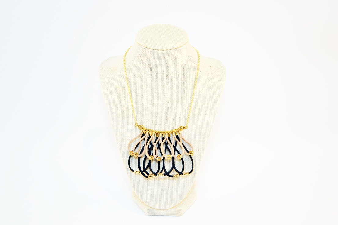 Looped fringe necklace in black and tan suede