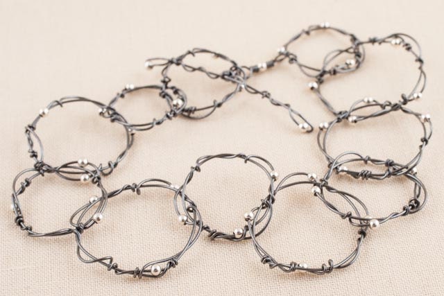 Linked Twisted Rings Bracelet, wire wrapped oxidized silver