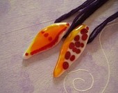Fiery Fraternal Twin Pendants