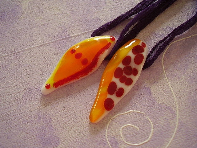 Fiery Fraternal Twin Pendants