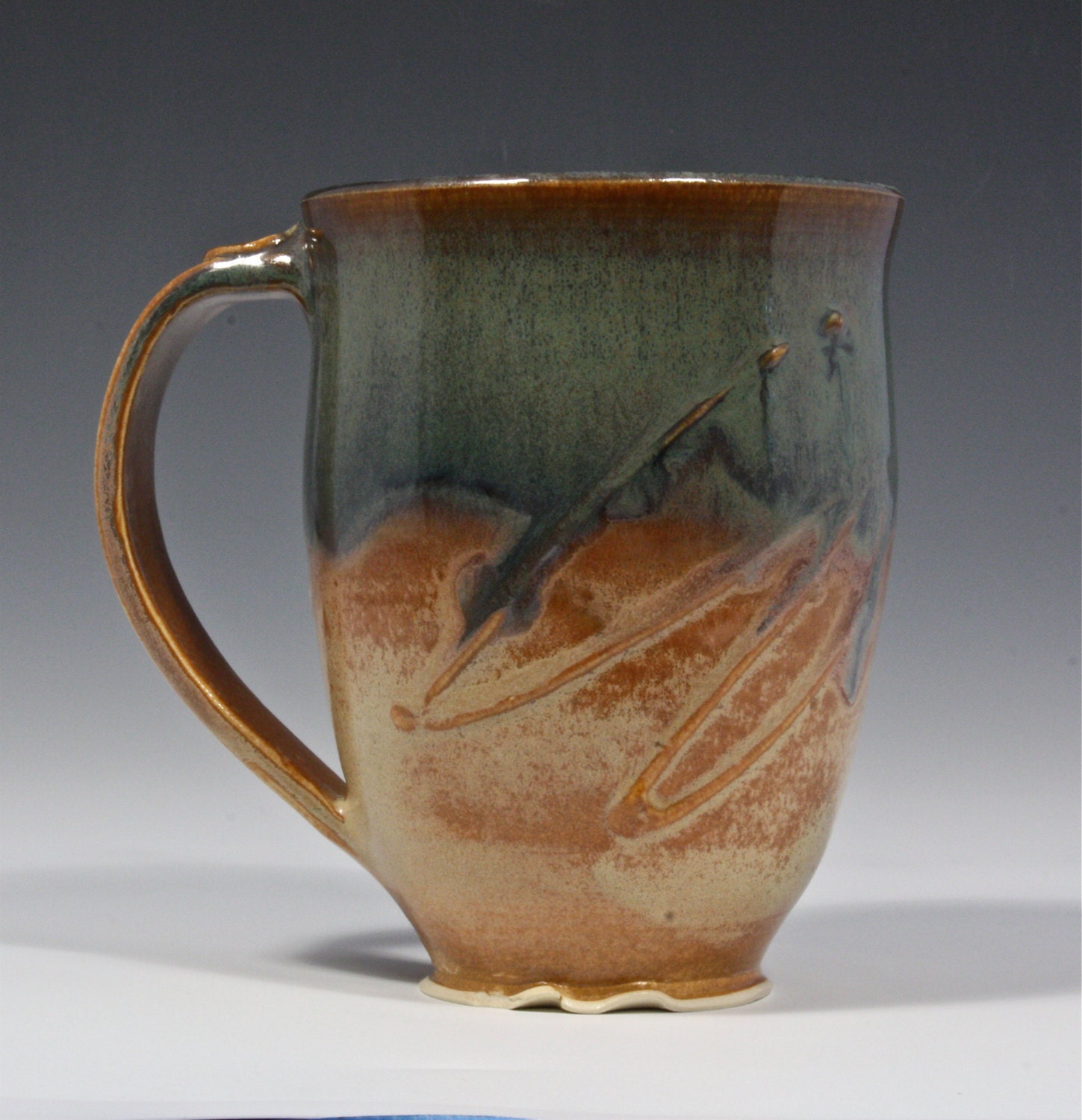 Textured Ceramic Coffee Mug in Green and Blue with Caramel and Cream