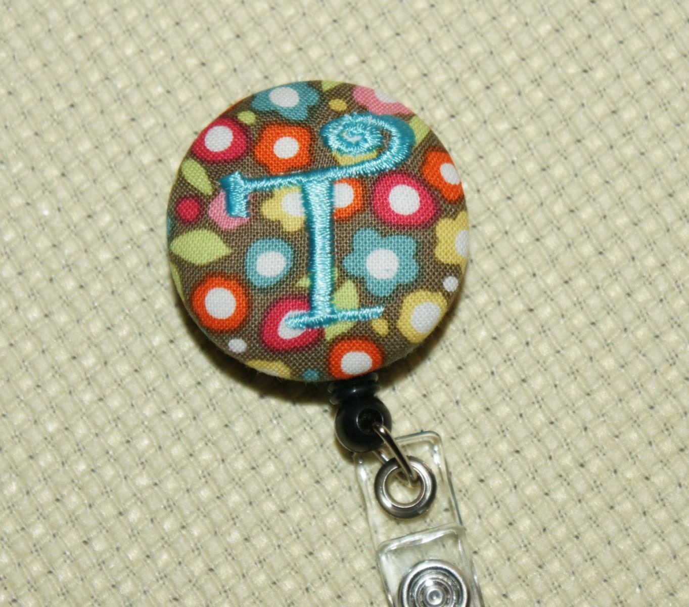 Many fabrics to design YOUR Badge Reel. Monogrammed single letter,