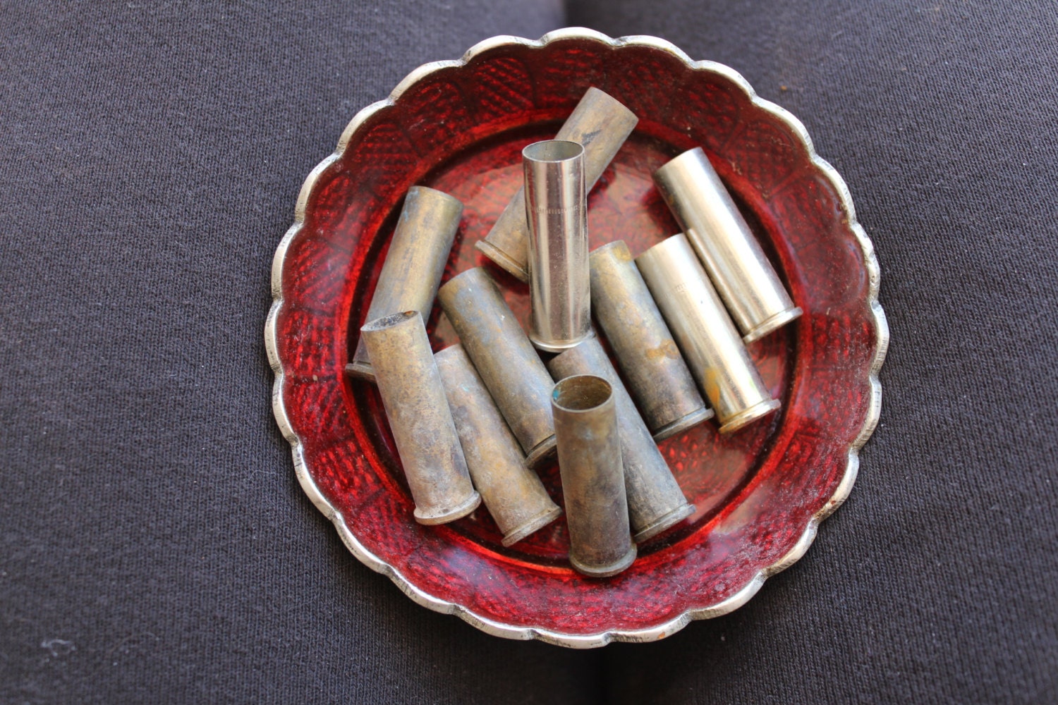 12 empty brass shell casings - 32x11mm