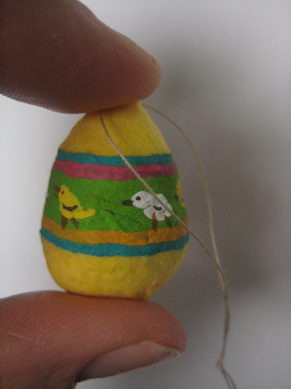 Small spun cotton egg with chicks ornament