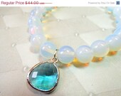 Sale 25% Off Opalite Crystal Beaded Bracelet With Faceted Ocean Blue Glass Charm and Leaf Charm