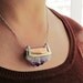 Mixed metals- Amethyst, sterling silver.bronze and copper necklace.
