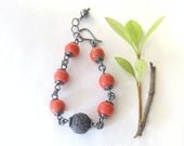 coral hue wire wrap bracelet, kazuri bead and sterling silver bracelet, rustic chunky bracelet
