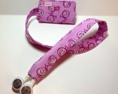 Bicycle TuneTube.  iPhone/iPod headphone/ear bud cord organizer.