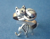 Silver cat ring with an elephant