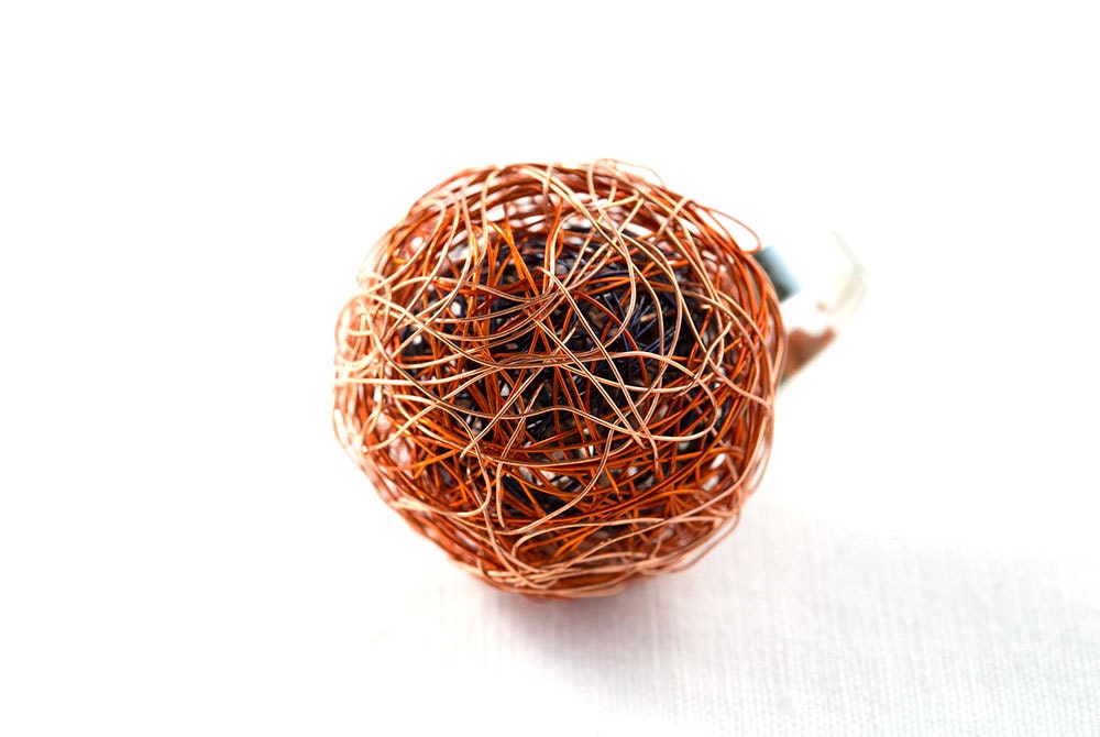 handmade ring wire wrapped ball handcrafted in dark-blue, orange and copper on adjustable ring blank lightweight and fun to wear