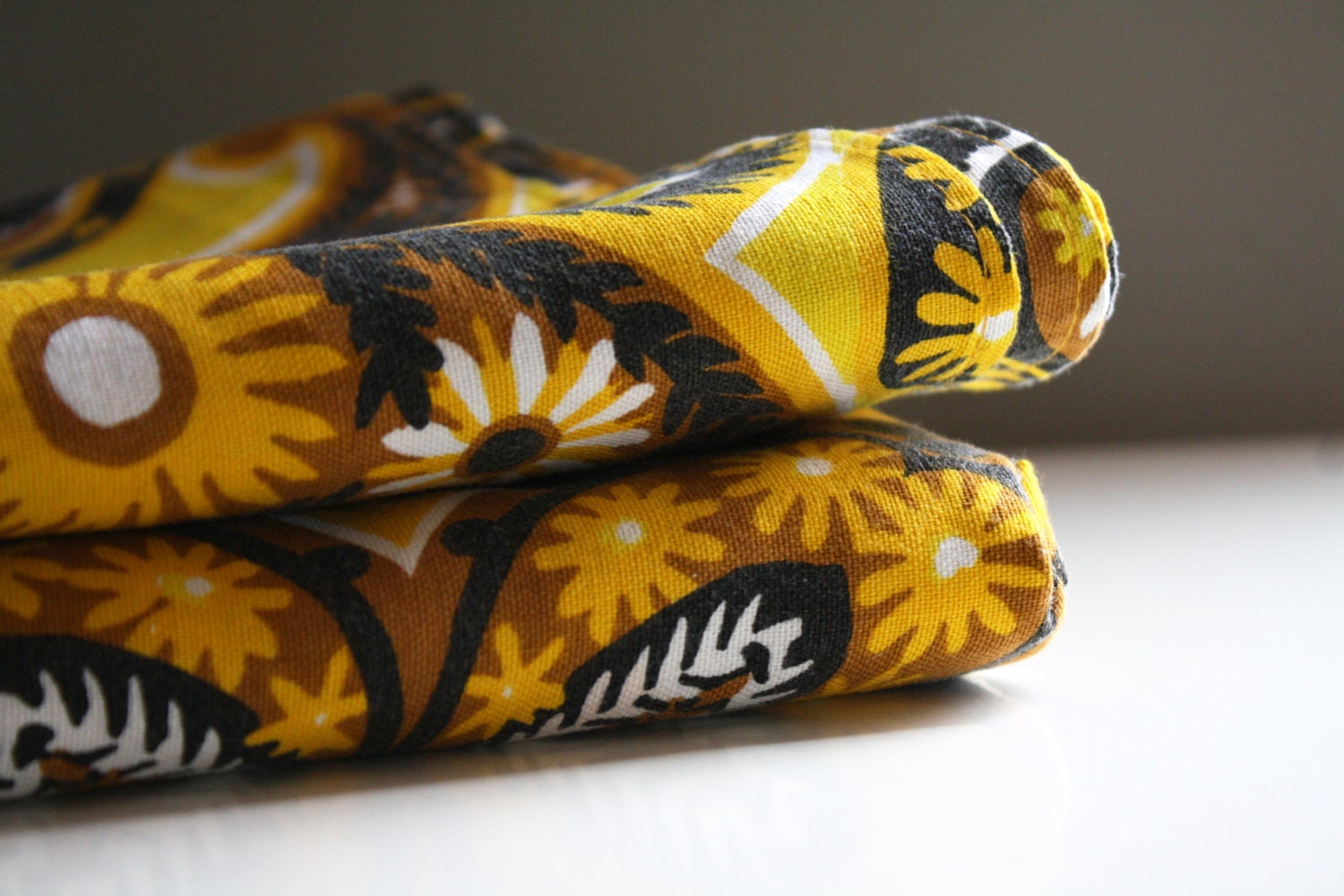 vintage. vera. bright yellow orange and black paisley floral tablecloth. table cloth. linen. 1960s.