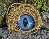 Gothic Steampunk Anime Evil Cat Eye Pendant in Blue Gold