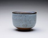 handmade teacup, pottery cup, tea bowl with orange shino and blue/gray wood ash glazes