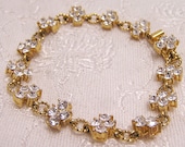Vintage Crystal Clear Rhinestone Bracelet Clustered Stones in Gold Colored Metal