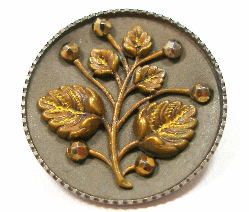 1800s metal BUTTON, Victorian cut steel with flowers.