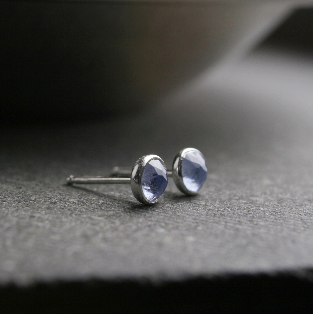 sterling silver bezel set untreated light blue sapphire stud earrings 4mm