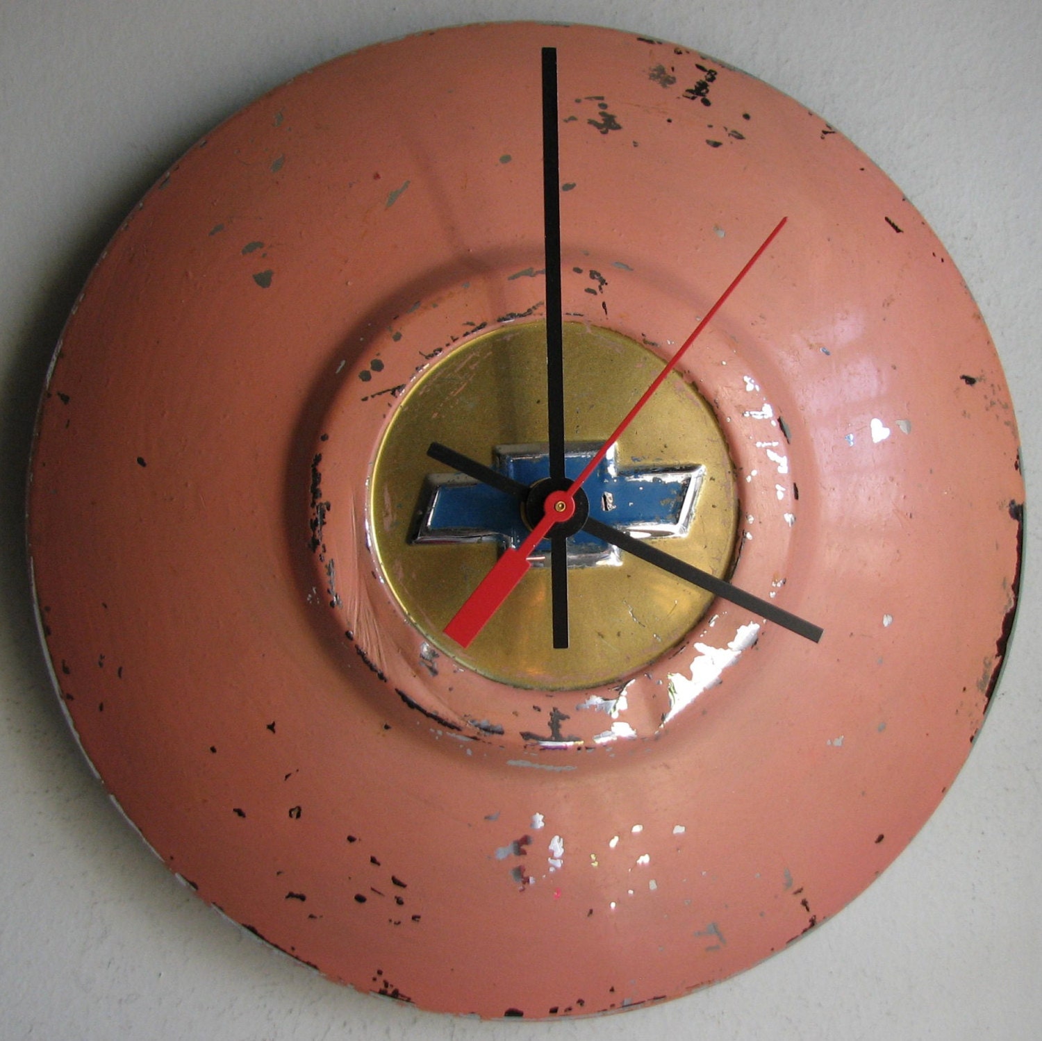 Painted pink chipped 1950 Chevy Hubcap Clock no. 1693
