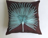 brown and aqua blue palm leaf pillow cover