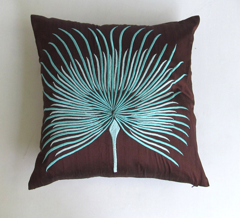 brown and aqua blue palm leaf pillow cover