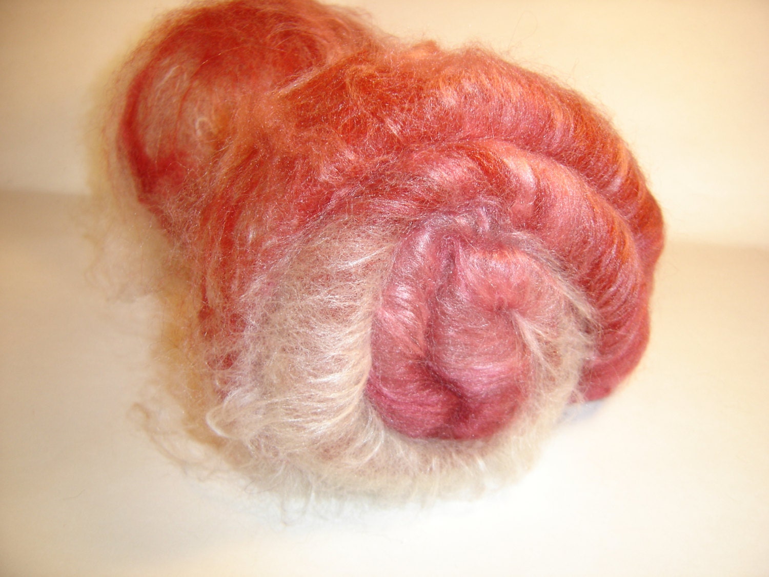 Batt , Roving, Spinning batt,  Cherry Swirl 2  oz  Llama,  wool,  Fire star, and bamboo in   Pink, red  and cream