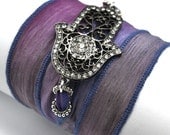 Monet Silk Wrap Bracelet with Ornate Gun Metal Rhinestone Hamsa