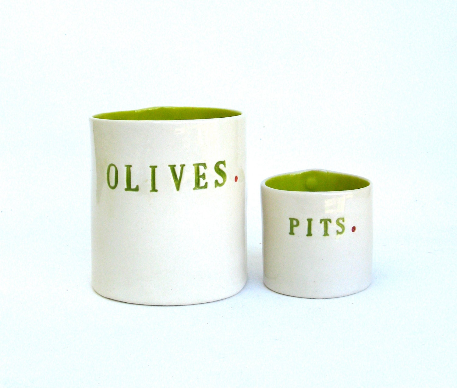 olives and pits  ....  hand built porcelain containers ...  vessels
