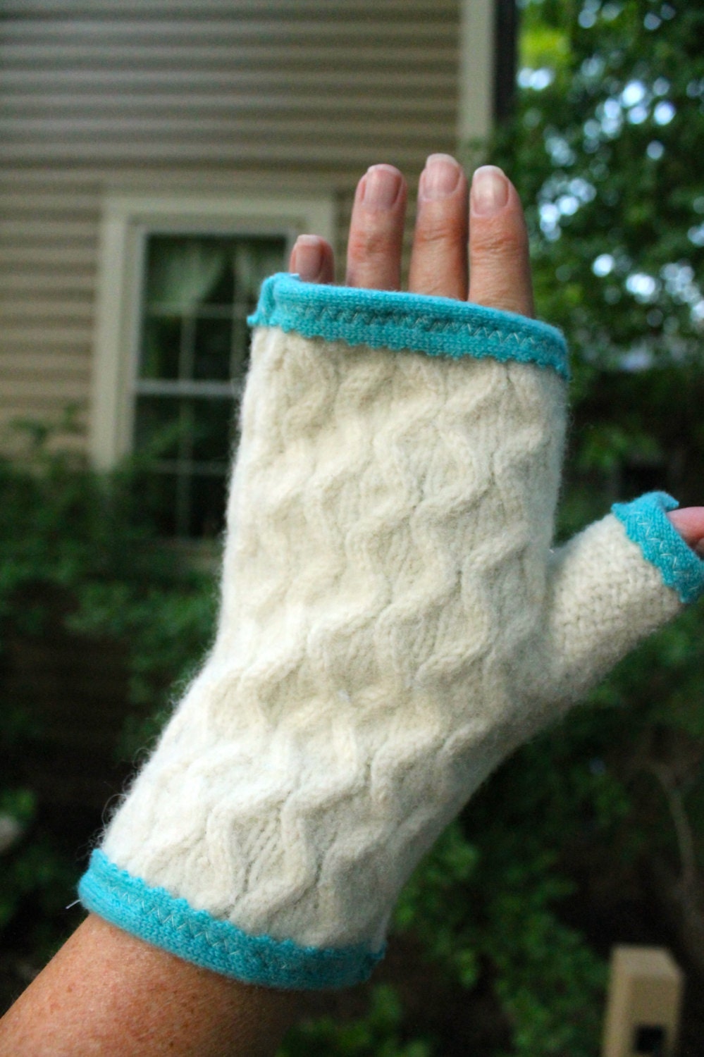 Recycled cashmere and wool fingerless gloves. Irish fisherman knit in ivory with turquoise lining.